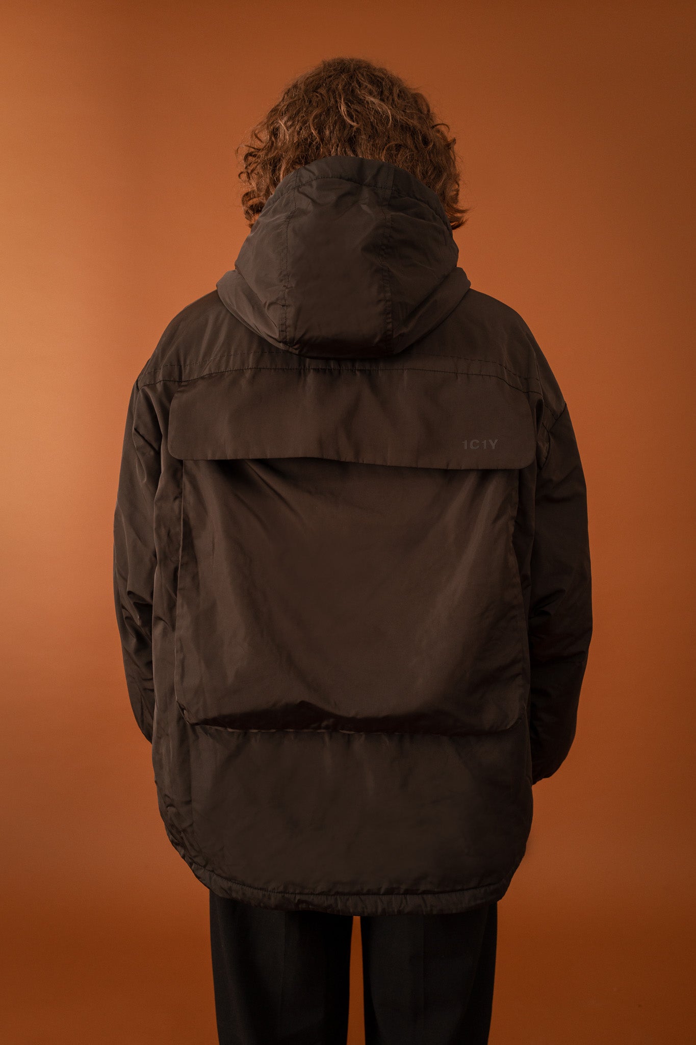 One Anorak in Rucksack faltbare Jacke in Grau