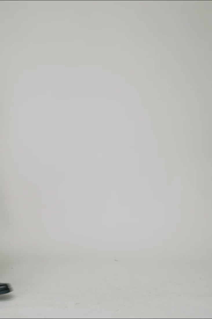Full size webshop video 360 degree of model natal1a in recycled nylon cape clean background showing cropped cut 1c1y