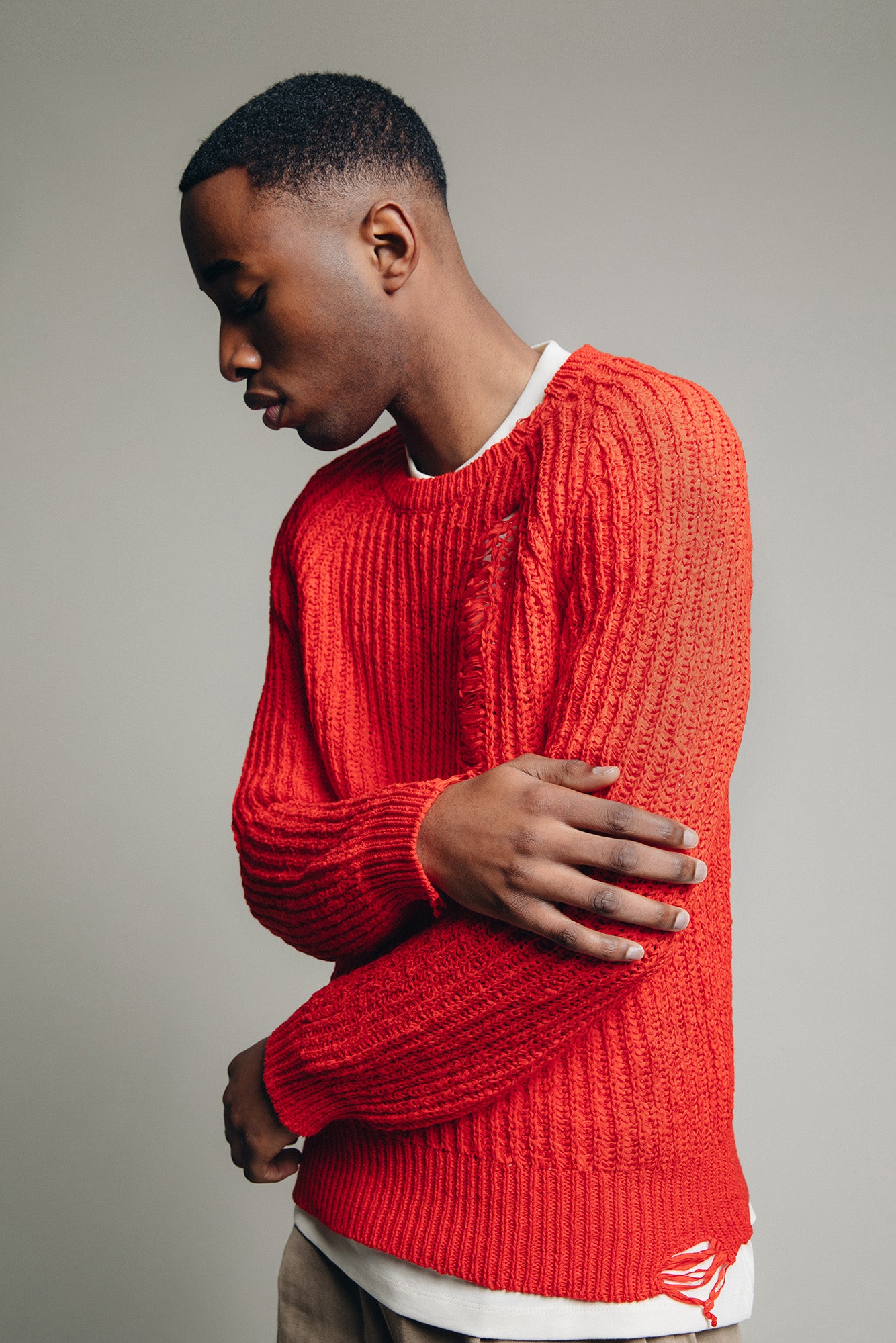 Distressed Knit Sweater in Red