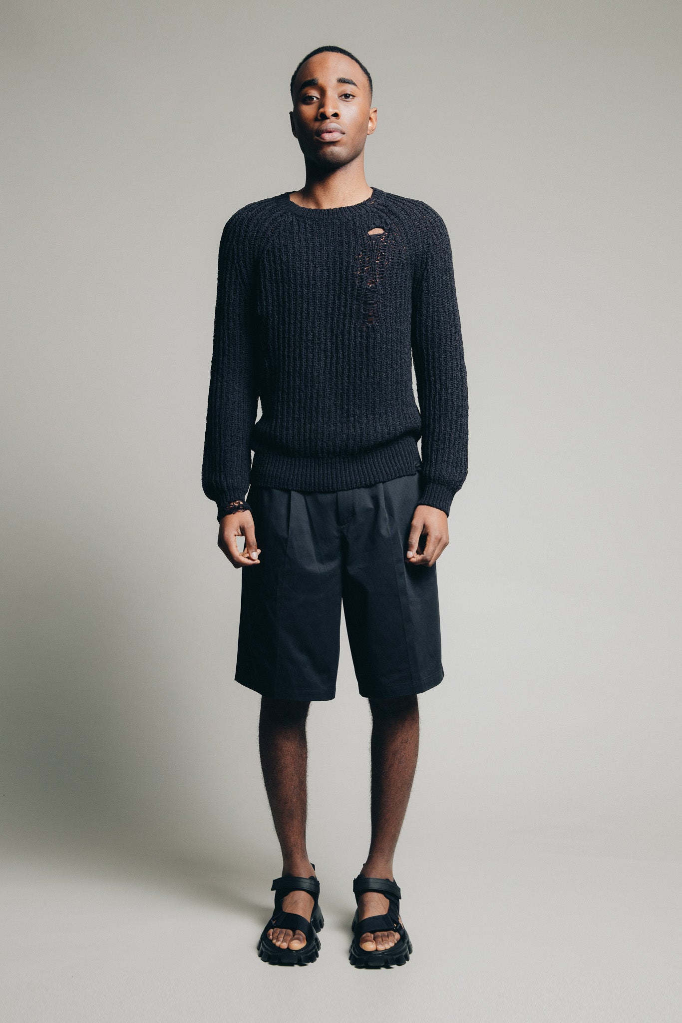 Distressed Knit Sweater in Black